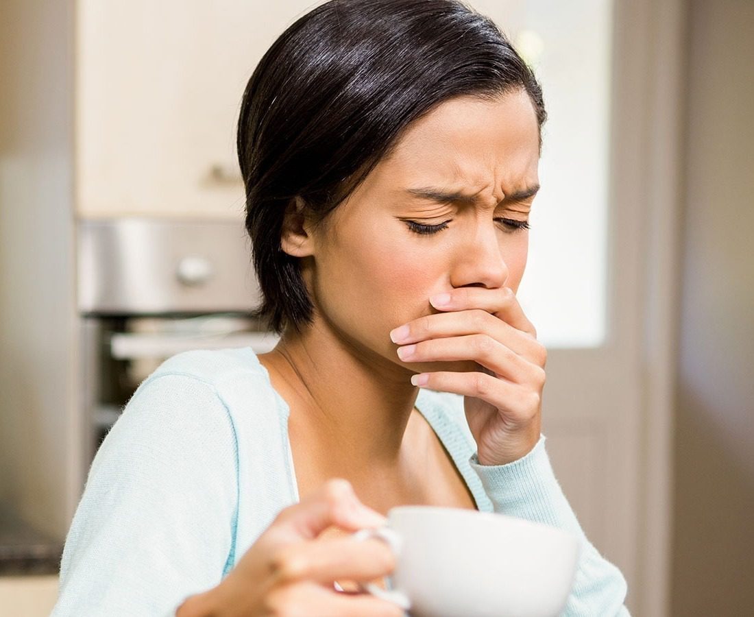 Young woman experiencing tooth pain